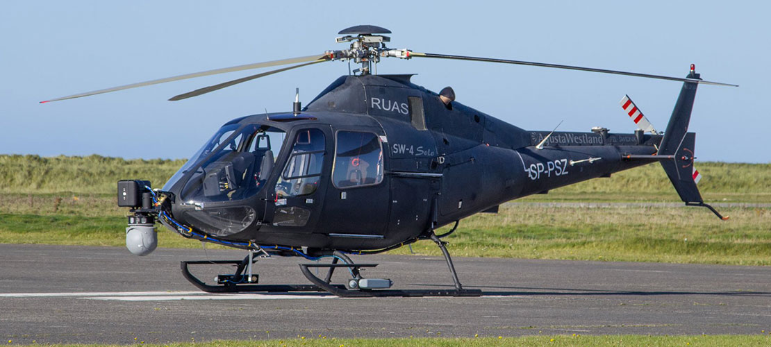 Leonardo SW4 SOLO helicopter stationary on runway