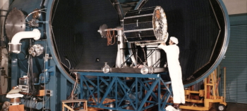 Photo of space equipment being pushing into a testing chamber