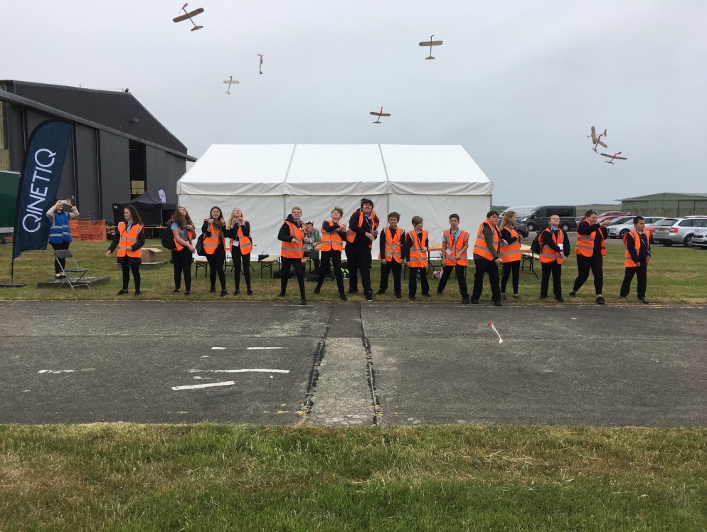 school children joining in STEM activities