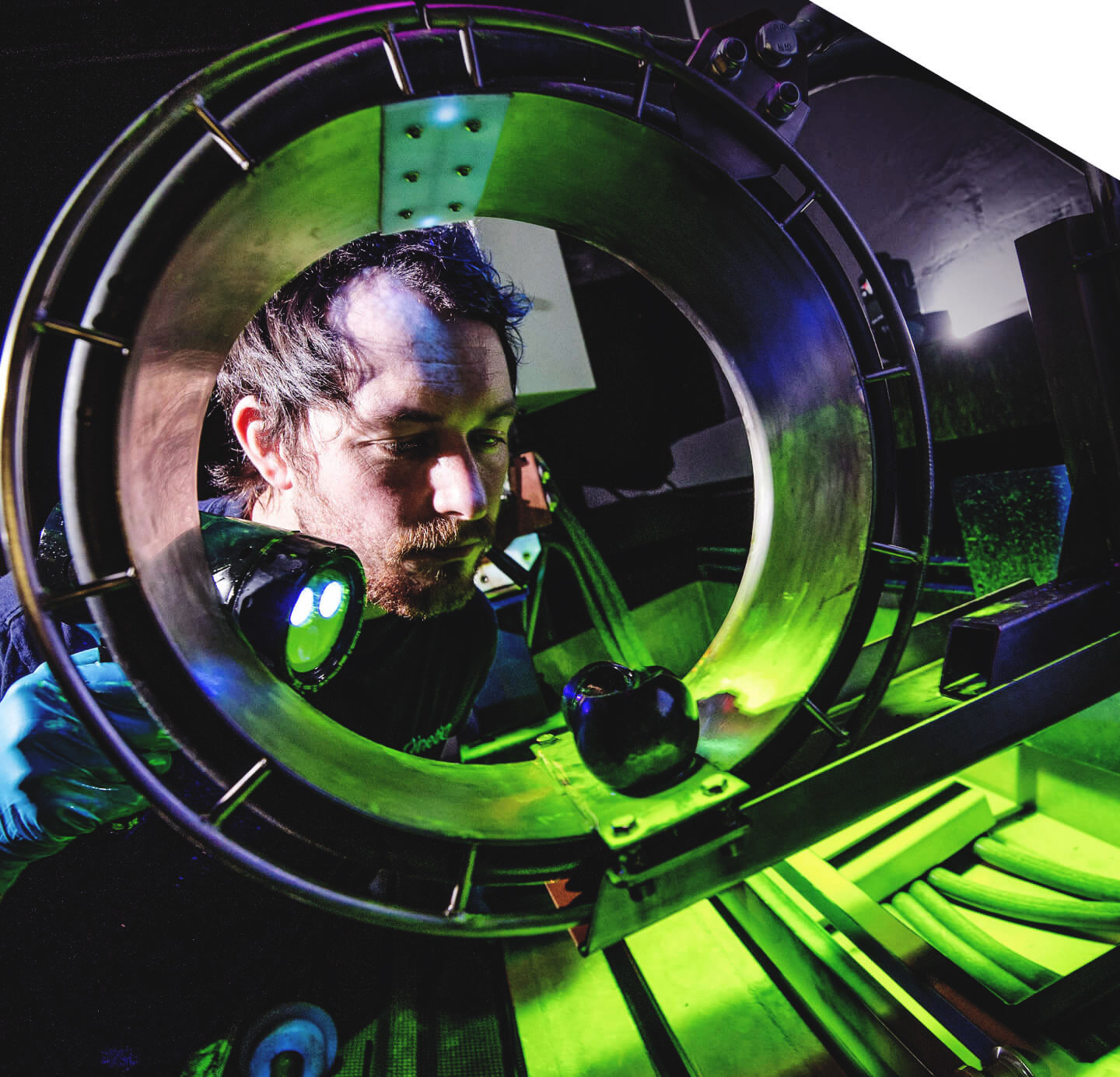 Technician inspecting equipment