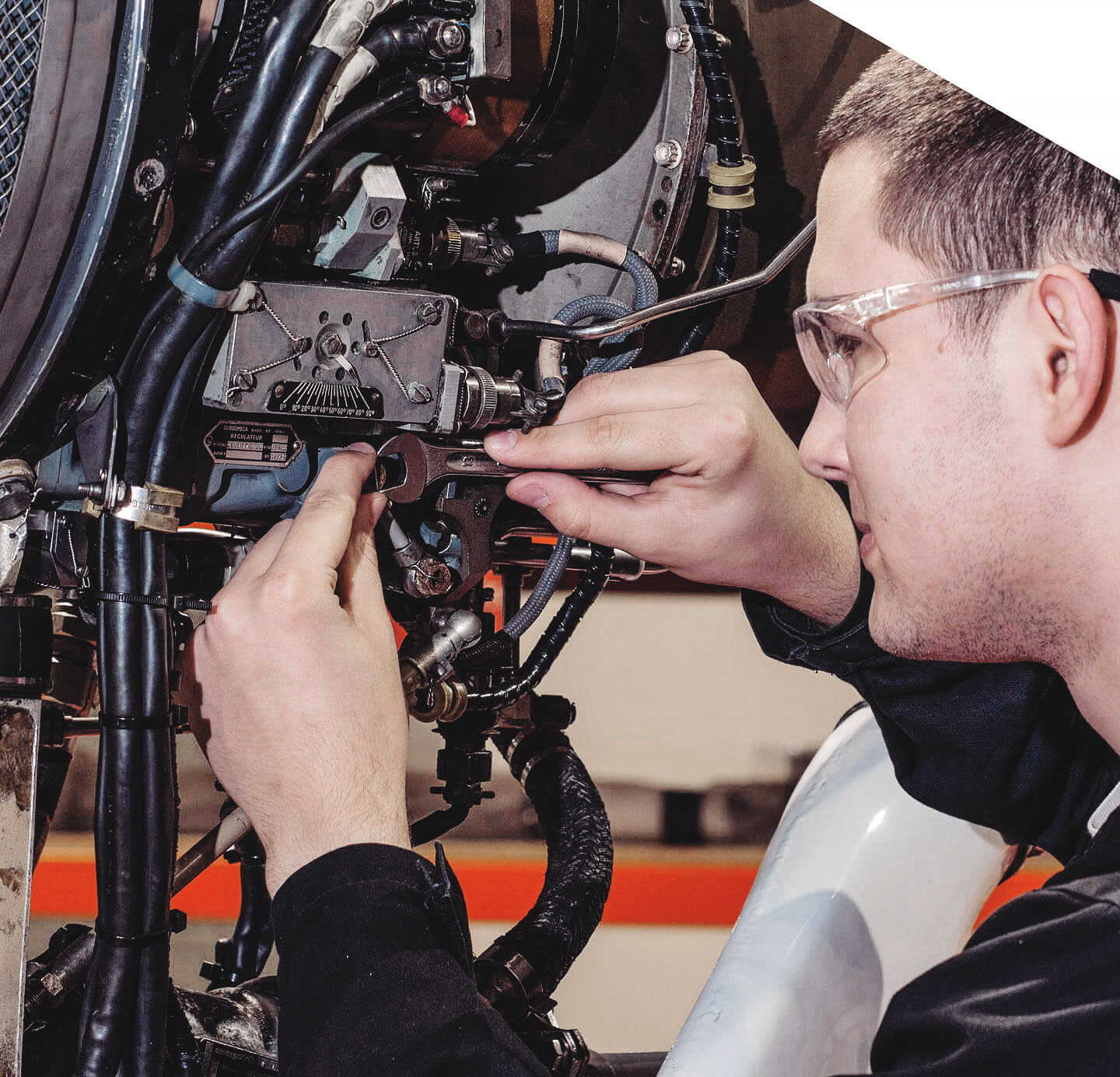 Technician inspecting equipment