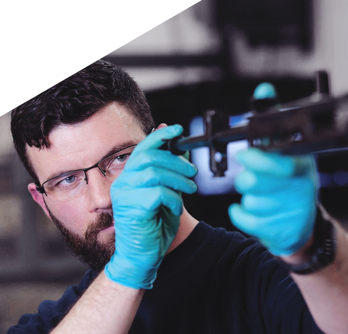 Technician inspecting equipment