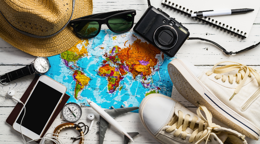 A table with travelling items placed on it